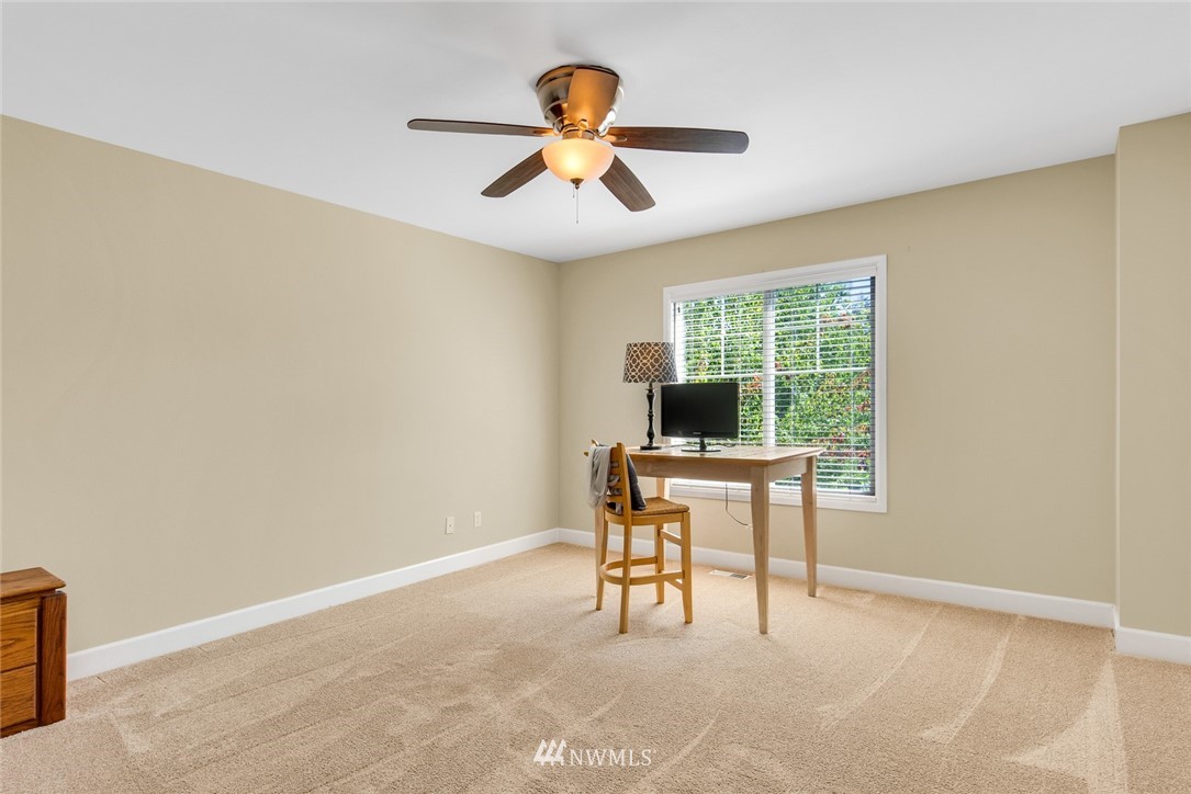 3613 209th Place Southeast Bothell, WA 98021 - Photo 23 of 28 a workspace with furniture and a window