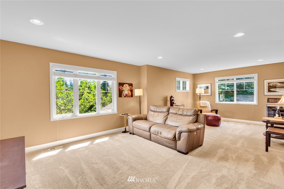 3613 209th Place Southeast Bothell, WA 98021 - Photo 24 of 28 a bedroom with furniture and a large window