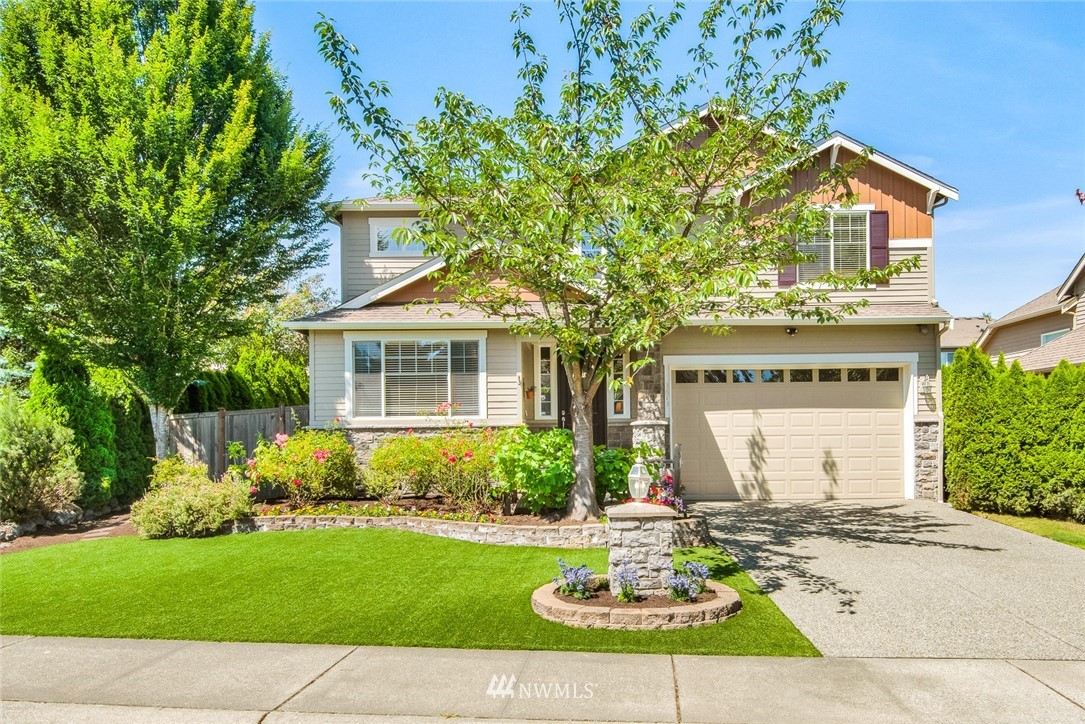 3613 209th Place Southeast Bothell, WA 98021 - Photo 28 of 28 a front view of a house with garden