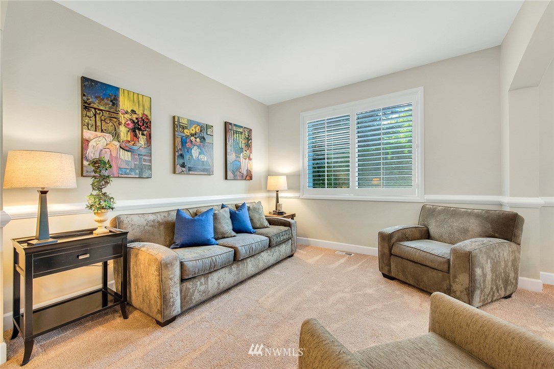 3613 209th Place Southeast Bothell, WA 98021 - Photo 5 of 28 a living room with furniture and a window