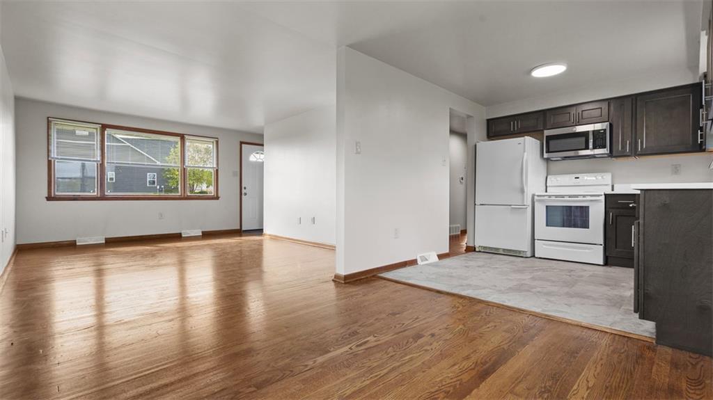 119 Linden Road Canonsburg, PA 15317 - Photo 13 of 41 a view of a kitchen with a sink dishwasher oven window and wooden floor