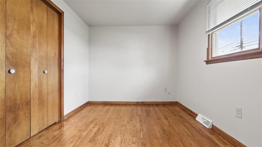 119 Linden Road Canonsburg, PA 15317 - Photo 22 of 41 a view of a room with wooden floor and brick walls