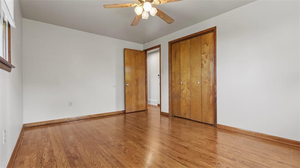 119 Linden Road Canonsburg, PA 15317 - Photo 28 of 41 a view of an empty room with wooden floor and a window