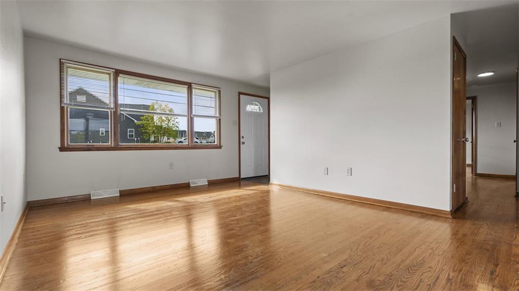 119 Linden Road Canonsburg, PA 15317 - Photo 8 of 41 an empty room with wooden floor and windows