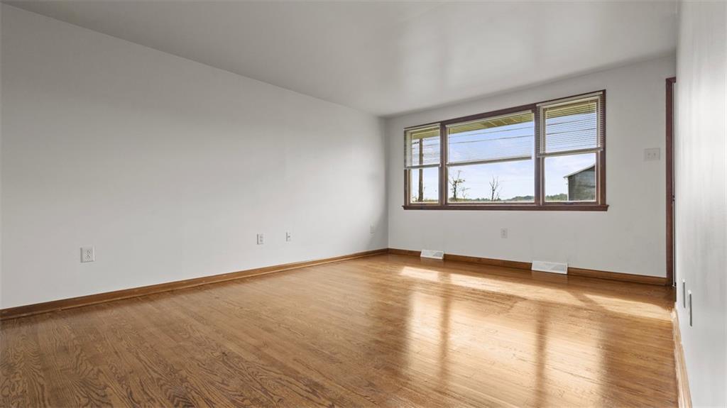 119 Linden Road Canonsburg, PA 15317 - Photo 10 of 41 an empty room with wooden floor and windows