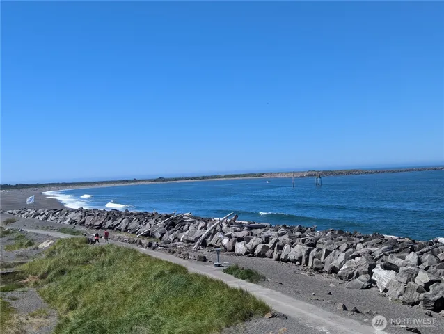a view of a dry area with a wooden fence