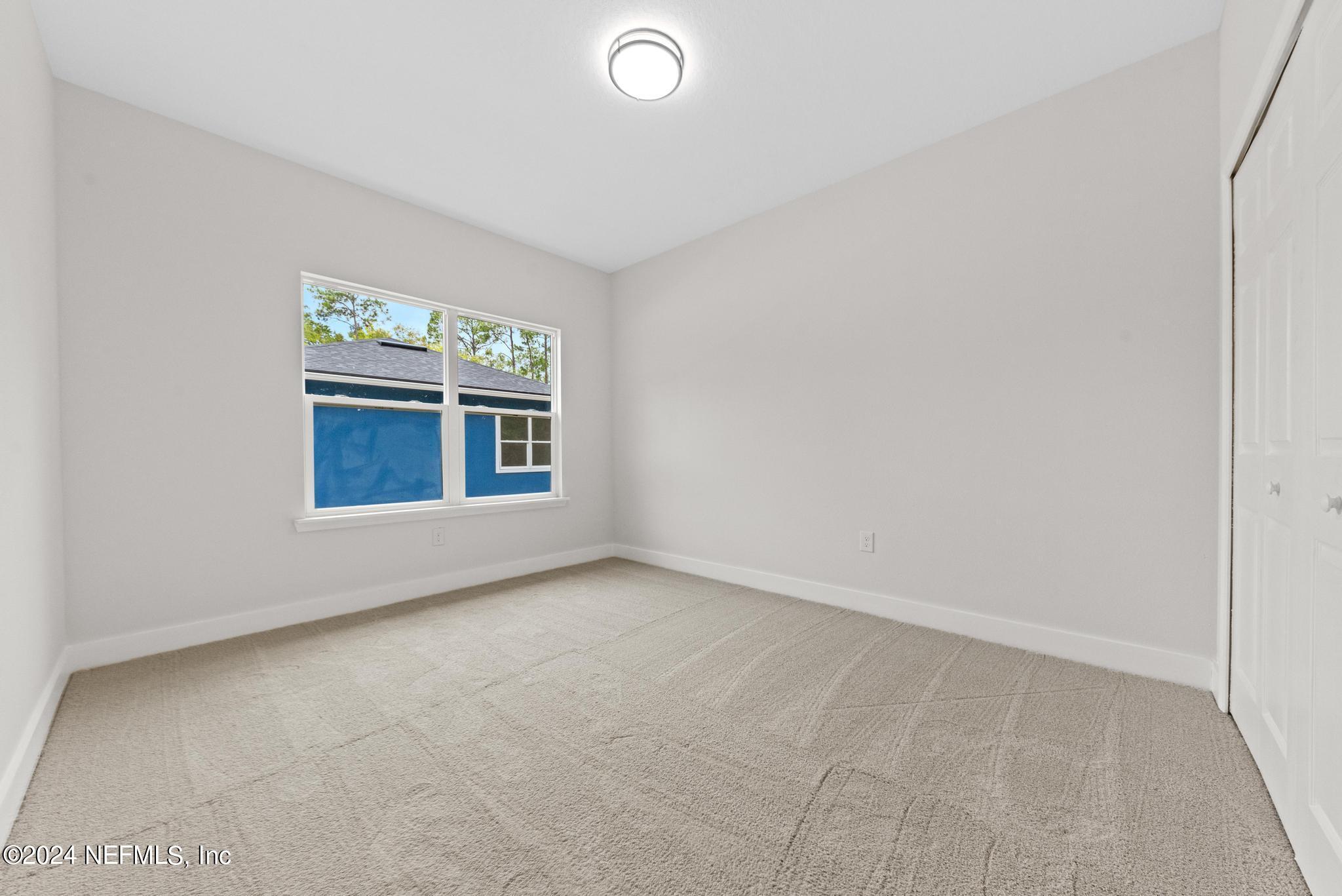 12731 Old St Augustine Road Jacksonville, FL 32258 - Photo 20 of 24 an empty room with windows