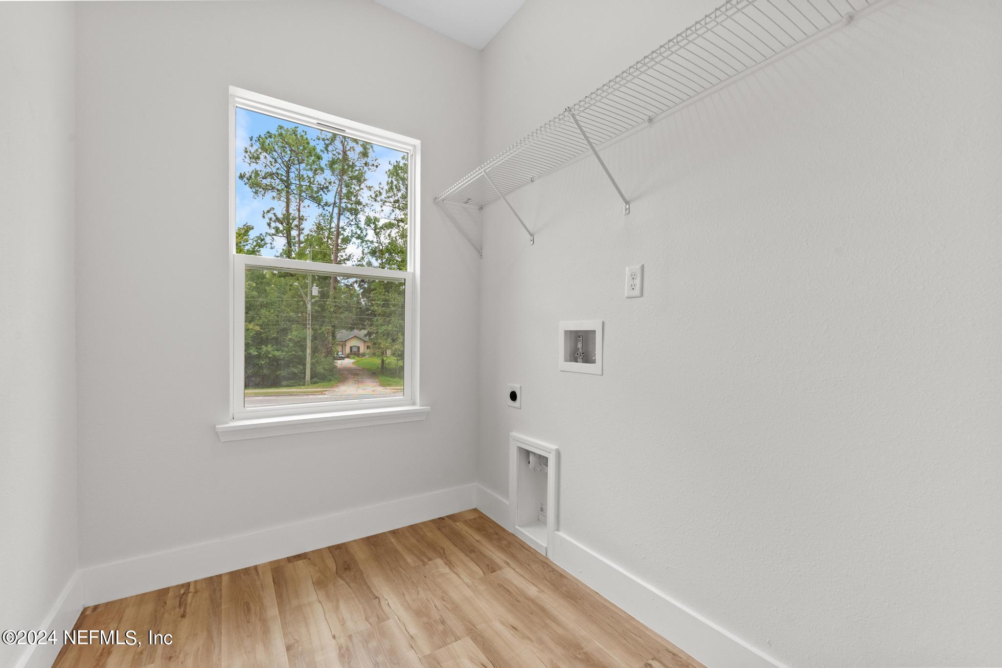 12731 Old St Augustine Road Jacksonville, FL 32258 - Photo 21 of 24 a view of a room that has a window in it