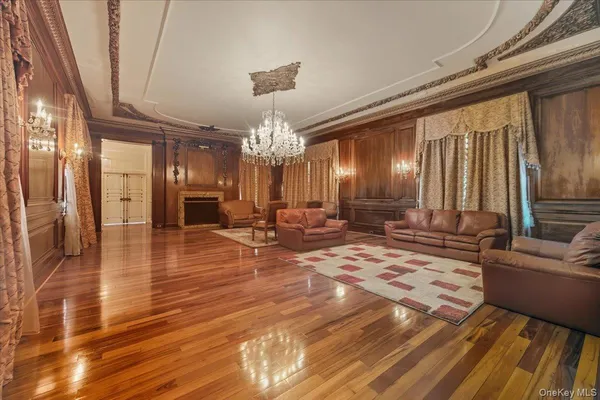 a living room with a couch and a fireplace