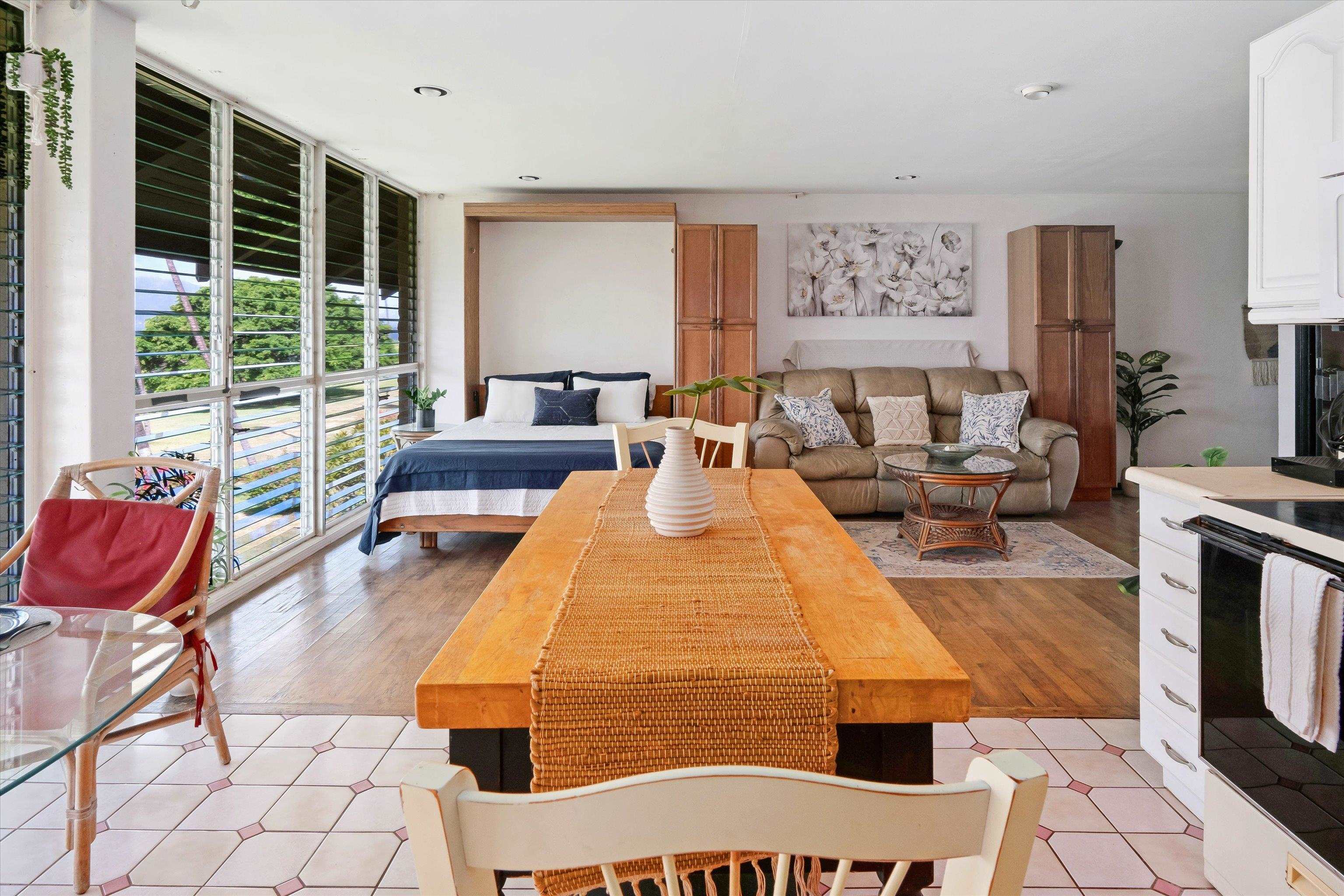 1002 South Kihei Road, Unit 314 Kihei, HI 96753 - Photo 20 of 31 a living room with furniture and a large window