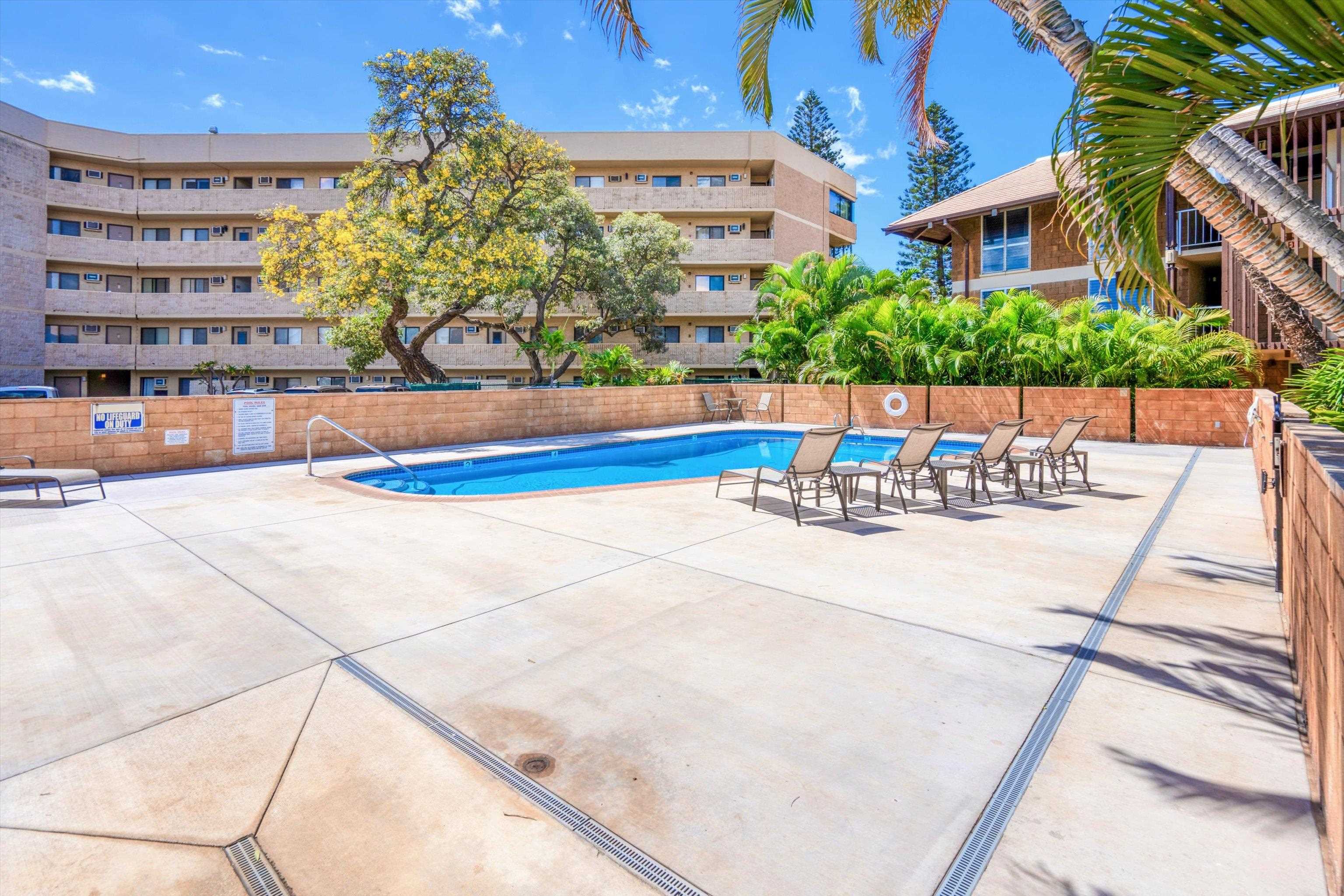 1002 South Kihei Road, Unit 314 Kihei, HI 96753 - Photo 22 of 31 a view of building with outdoor seating