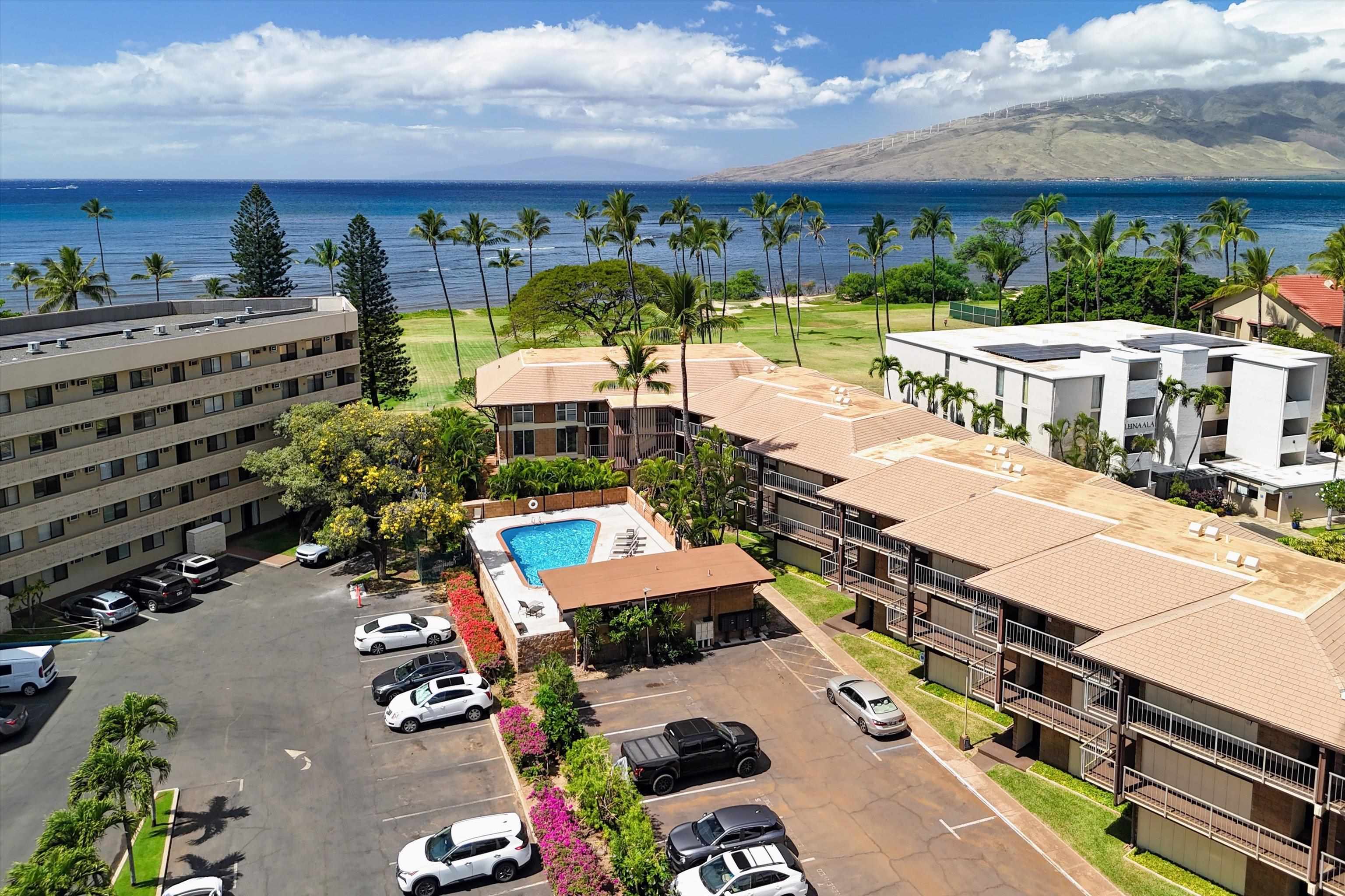 1002 South Kihei Road, Unit 314 Kihei, HI 96753 - Photo 24 of 31 a view of a city with lawn chairs