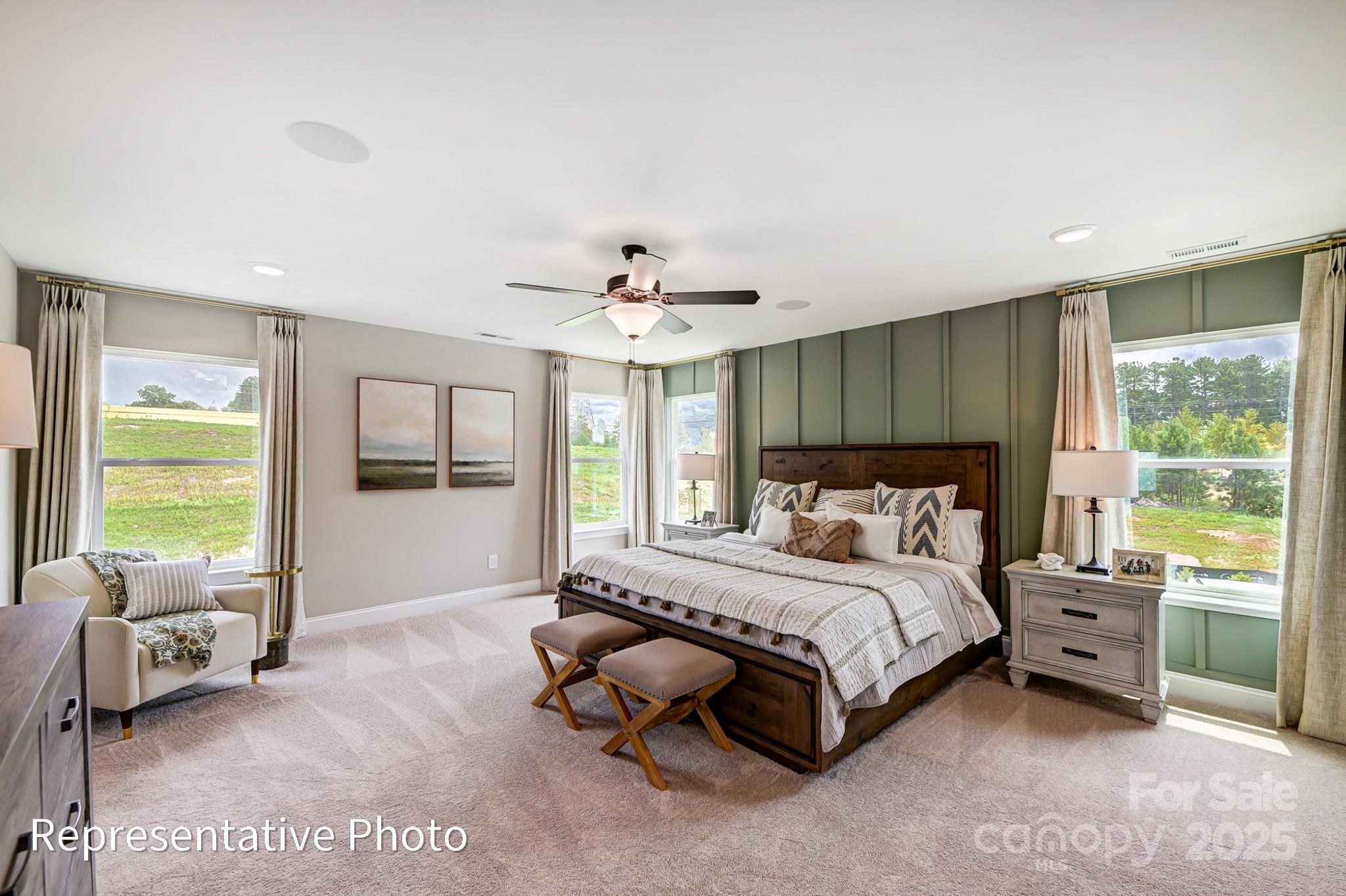 5038 Mclaughlin Loop Waxhaw, NC 28173 - Photo 15 of 25 a bedroom with a bed and a large window