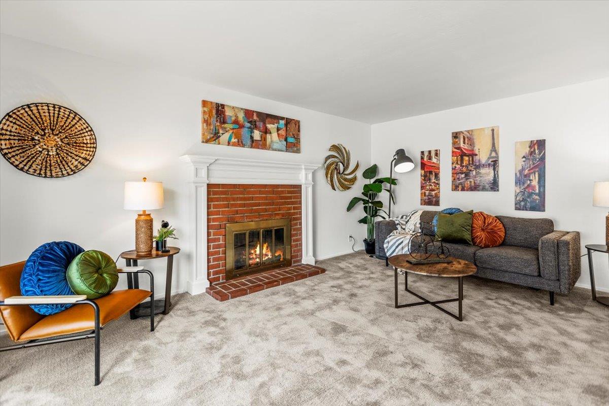 4155 Keith Drive San Jose, CA 95008 - Photo 11 of 28 a living room with furniture and a fireplace