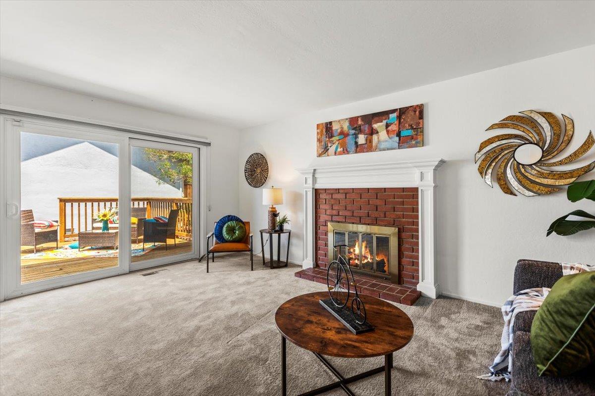 4155 Keith Drive San Jose, CA 95008 - Photo 12 of 28 a living room with furniture and a fireplace