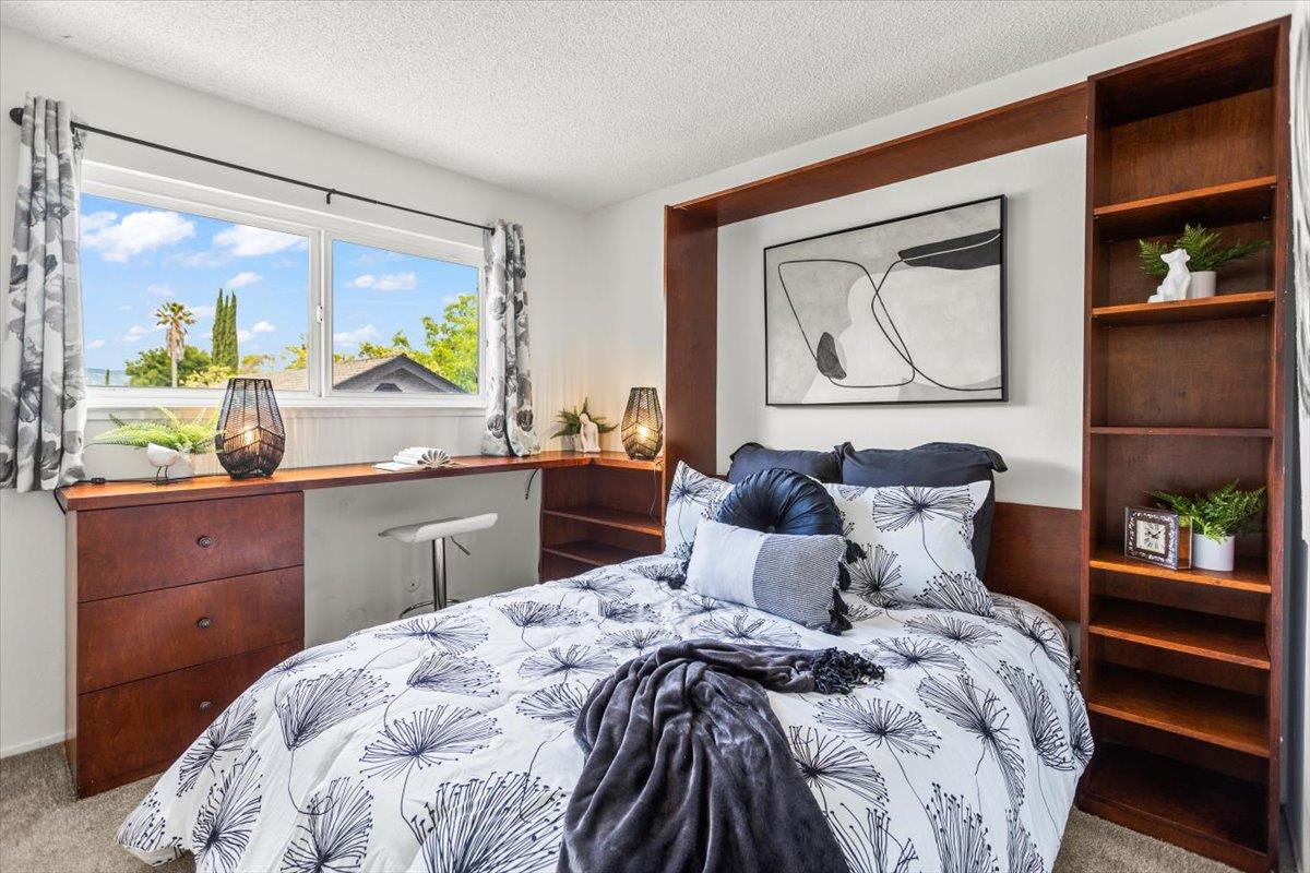 4155 Keith Drive San Jose, CA 95008 - Photo 17 of 28 a bedroom with a bed and a large window
