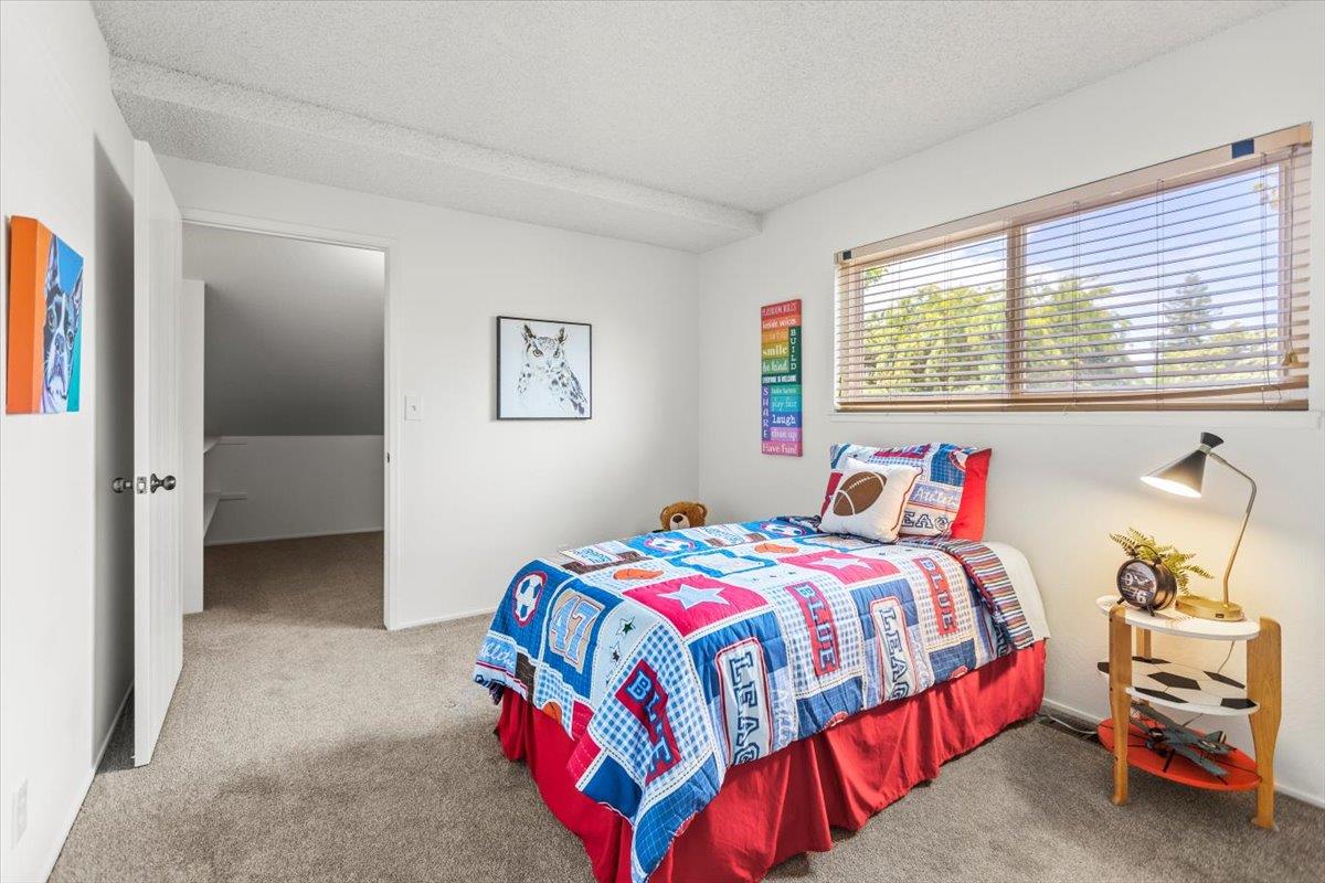 4155 Keith Drive San Jose, CA 95008 - Photo 18 of 28 a bedroom with a bed and a window