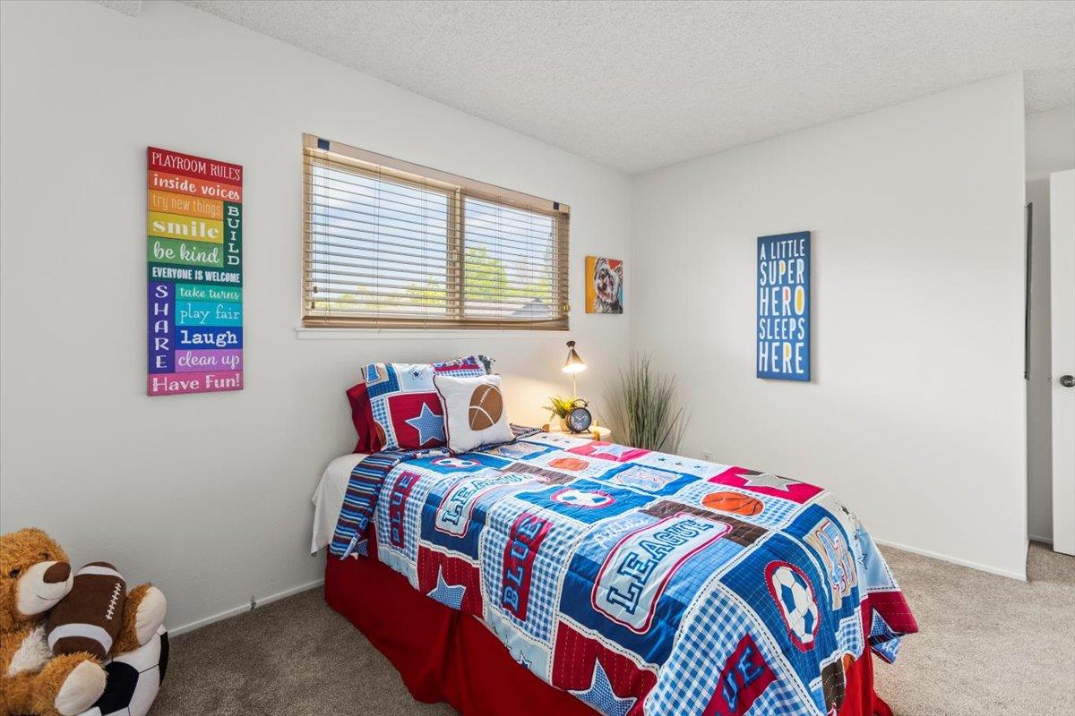 4155 Keith Drive San Jose, CA 95008 - Photo 19 of 28 a bedroom with a bed and a window