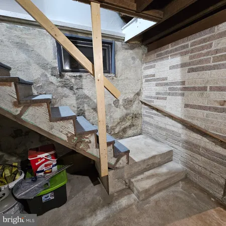 a utility room with fireplace