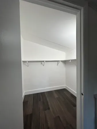 a bathroom with a sink a toilet and vanity