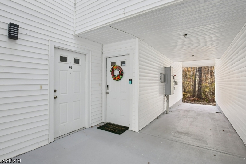 66 Whisper Way East Ledgewood, NJ 07852 - Photo 1 of 38 a view of a livingroom with an empty space