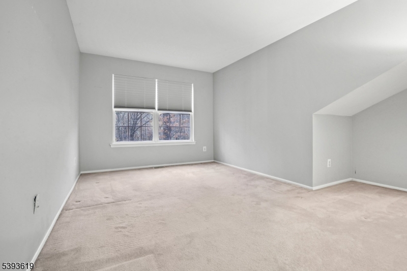 66 Whisper Way East Ledgewood, NJ 07852 - Photo 17 of 38 an empty room with windows