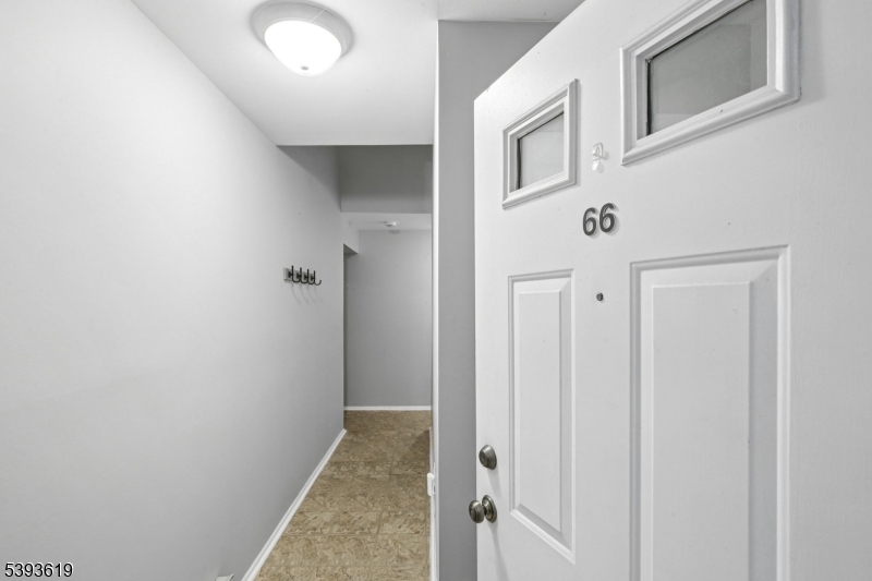 66 Whisper Way East Ledgewood, NJ 07852 - Photo 2 of 38 a view of a hallway with closet and entryway