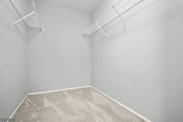 a view of small space with racks on the wall