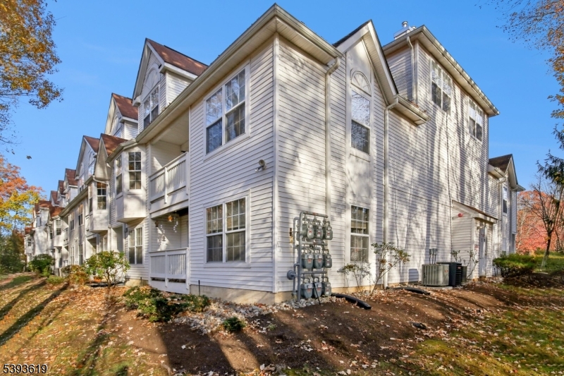 66 Whisper Way East Ledgewood, NJ 07852 - Photo 27 of 38 a view of a house with a yard