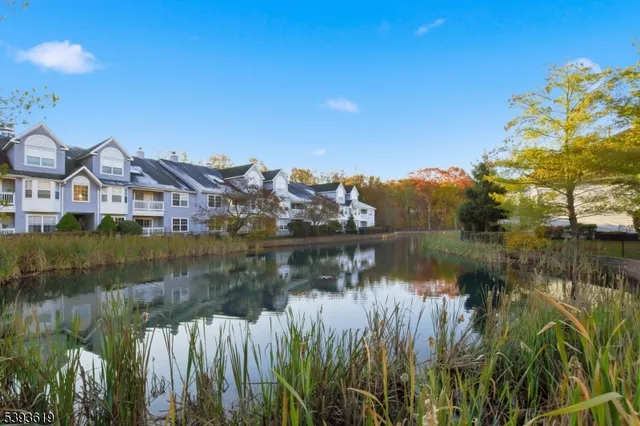 a view of a lake with houses