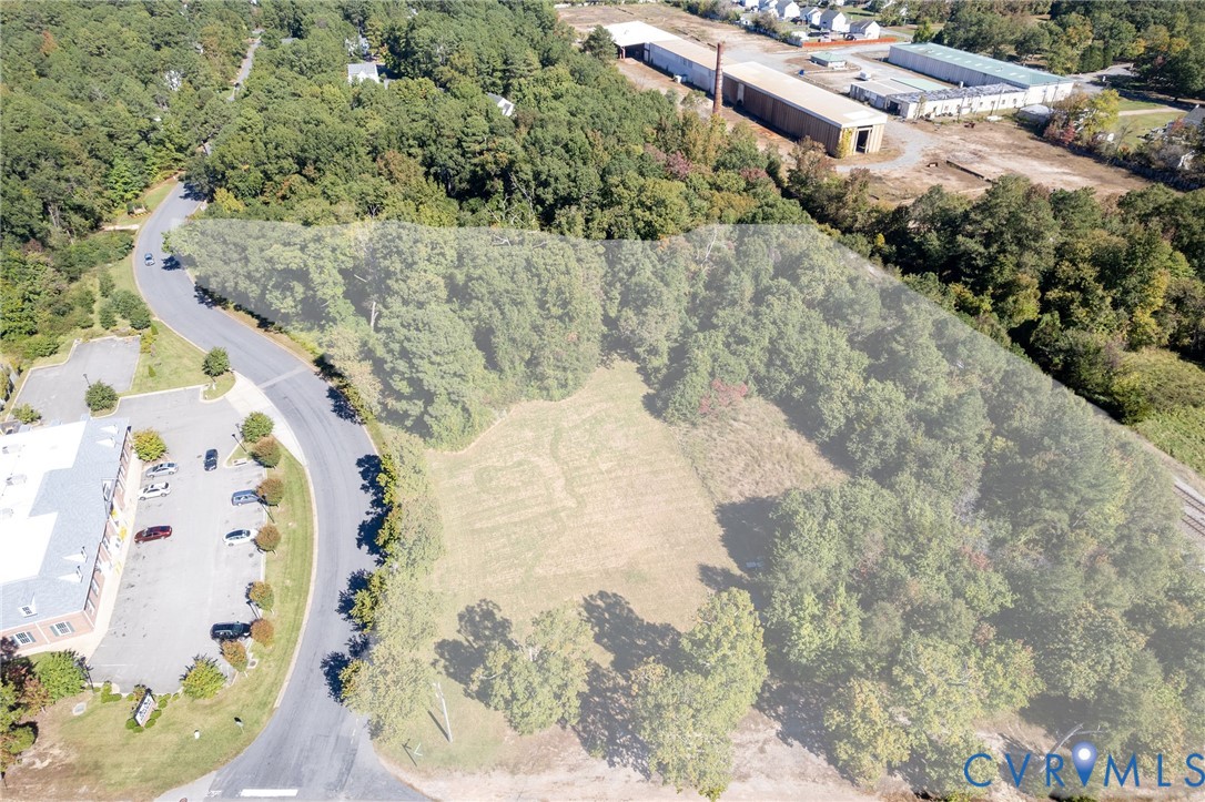 3002 Mountain Road Glen Allen, VA 23060 - Photo 3 of 13 Cleared and partially wooded parcel with a paved r