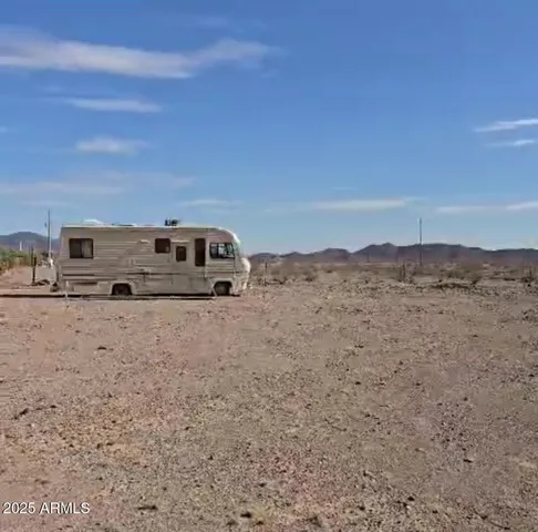 a view of balcony with wooden floor