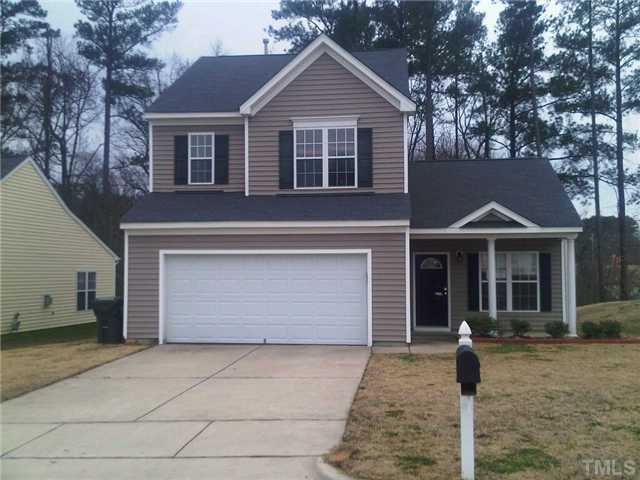 808 Nightshade Way Raleigh, NC 27610 - Photo 1 of 3 a front view of a house with garden