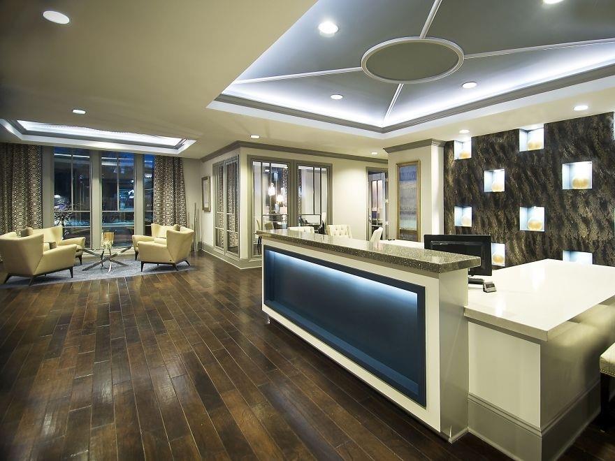 2420 Peachtree Road Northwest, Unit 1205 Atlanta, GA 30305 - Photo 16 of 39 a kitchen with stainless steel appliances granite countertop a stove and a refrigerator