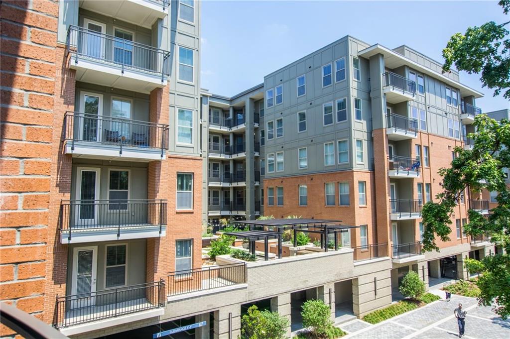 2420 Peachtree Road Northwest, Unit 1205 Atlanta, GA 30305 - Photo 32 of 39 a front view of a building with glass windows