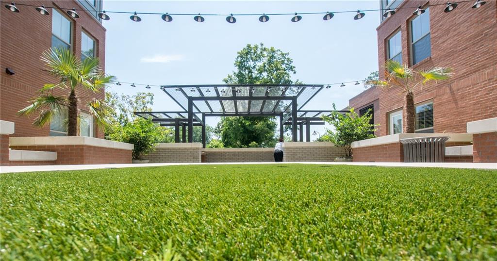2420 Peachtree Road Northwest, Unit 1205 Atlanta, GA 30305 - Photo 35 of 39 a view of a swimming pool with a patio