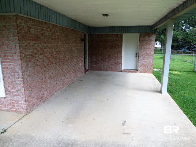 204 West Sycamore Avenue Foley, AL 36535 - Photo 9 of 11 One car carport.