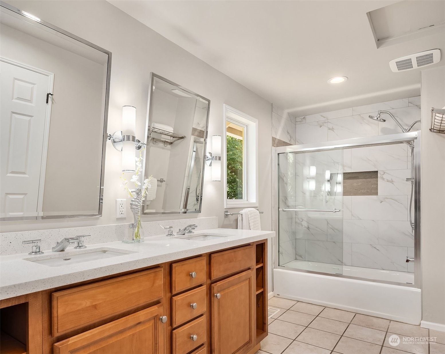 36 Decatur Key Bellevue, WA 98006 - Photo 12 of 40 a bathroom with a shower sink vanity and mirror
