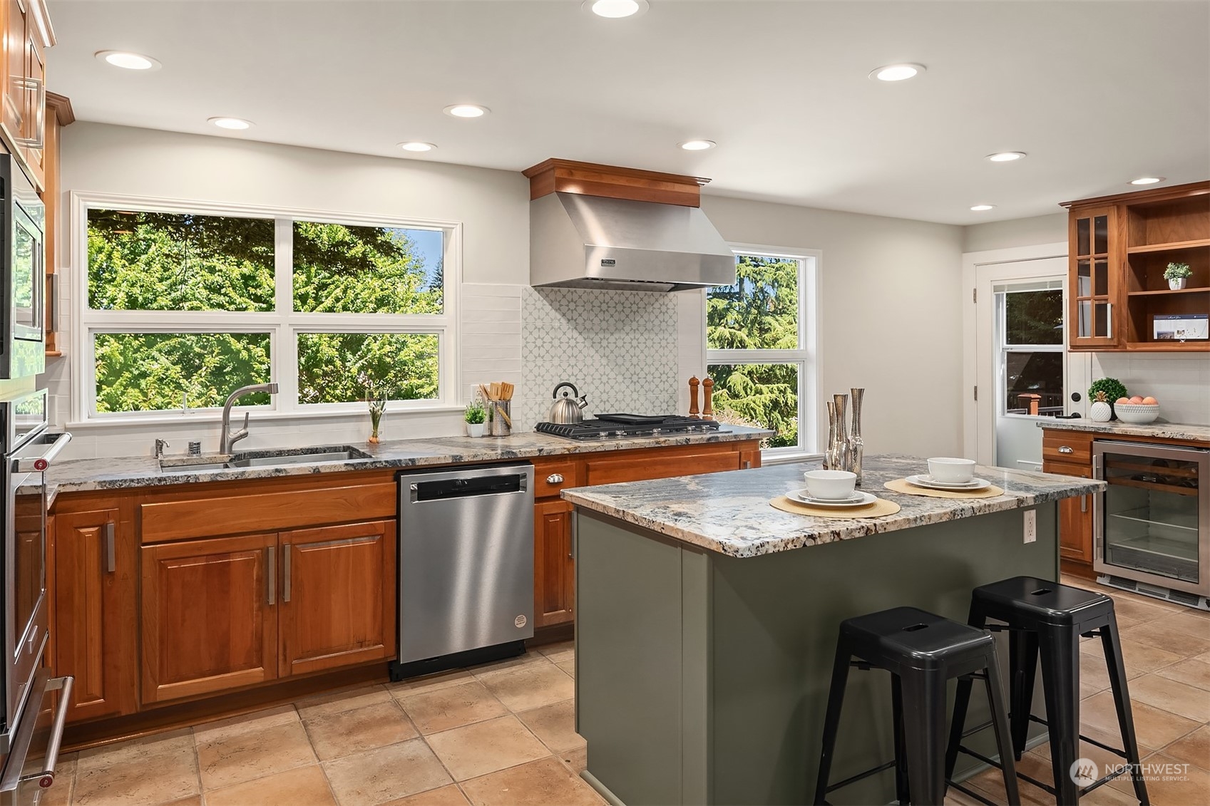 36 Decatur Key Bellevue, WA 98006 - Photo 20 of 40 a kitchen with a sink window and cabinets