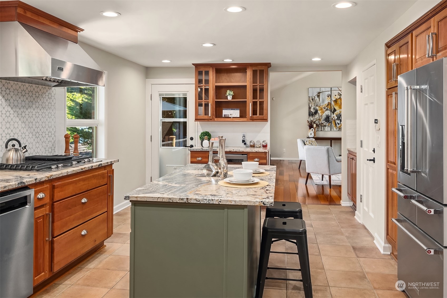 36 Decatur Key Bellevue, WA 98006 - Photo 21 of 40 a kitchen with stainless steel appliances granite countertop a sink stove and refrigerator