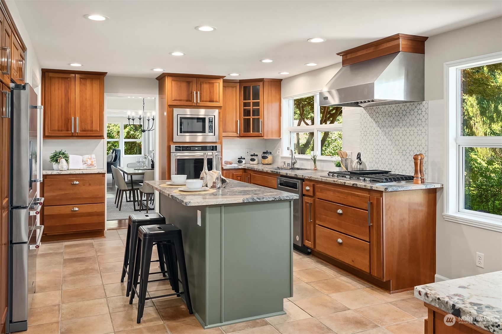 36 Decatur Key Bellevue, WA 98006 - Photo 24 of 40 a kitchen with stainless steel appliances granite countertop a stove and a sink