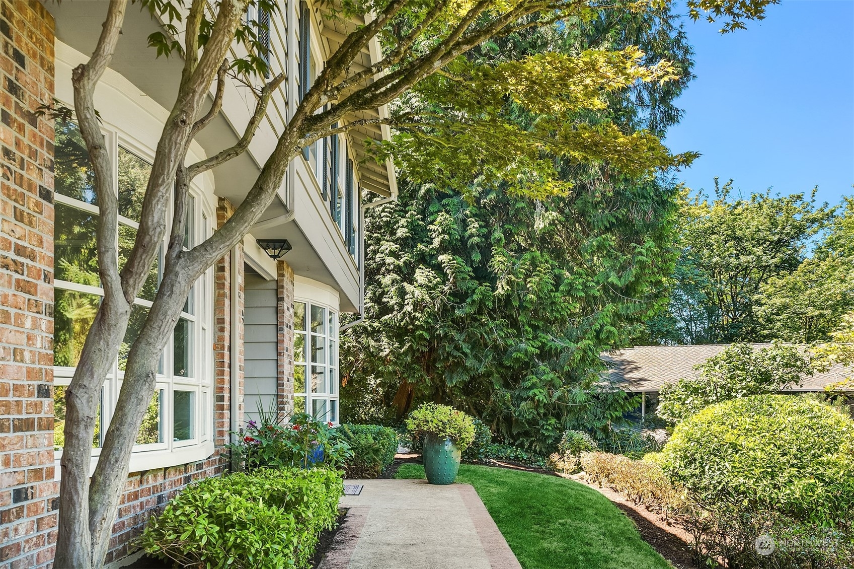 36 Decatur Key Bellevue, WA 98006 - Photo 32 of 40 a front view of a house with a yard and fountain