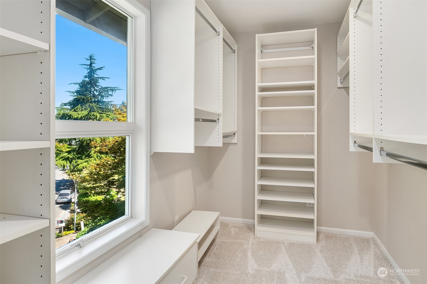 36 Decatur Key Bellevue, WA 98006 - Photo 7 of 40 a view of closet with wooden floor and windows