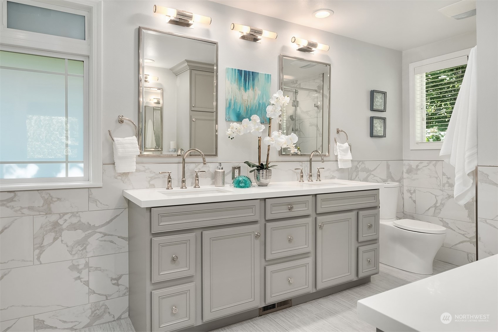 36 Decatur Key Bellevue, WA 98006 - Photo 8 of 40 a bathroom with a double vanity sink toilet and a mirror