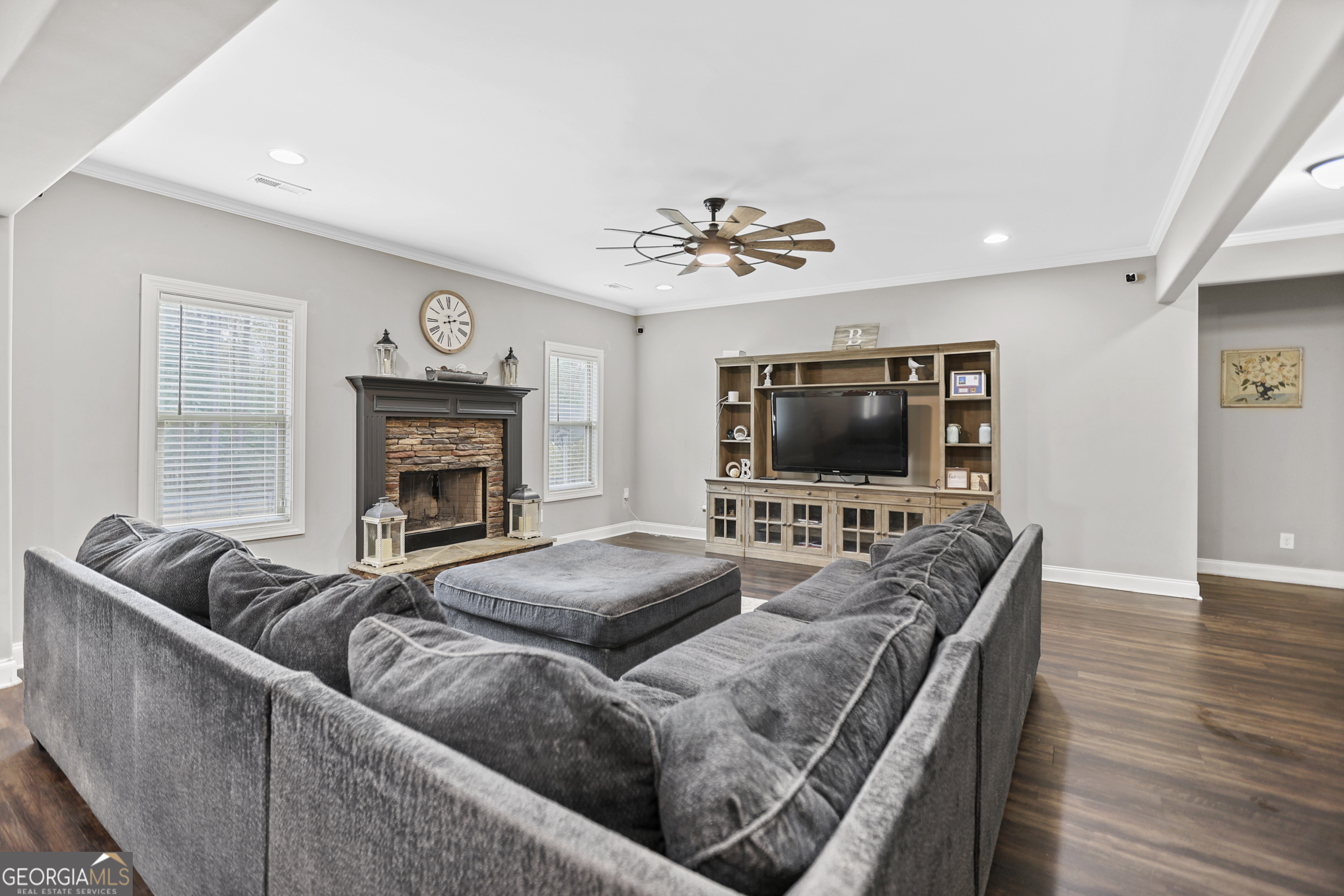 22 Huntsman Run Senoia, GA 30276 - Photo 16 of 69 a living room with furniture and a flat screen tv