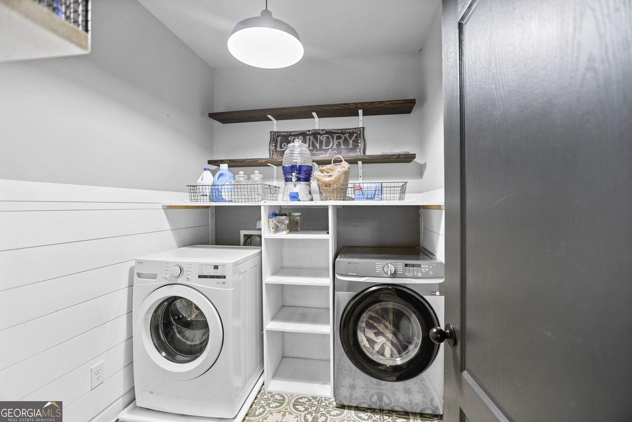 22 Huntsman Run Senoia, GA 30276 - Photo 28 of 69 a utility room with sink dryer and washer