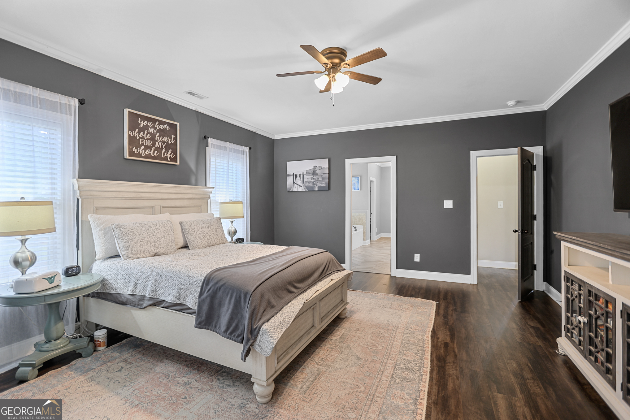 22 Huntsman Run Senoia, GA 30276 - Photo 34 of 69 a spacious bedroom with a bed and a view of bathroom