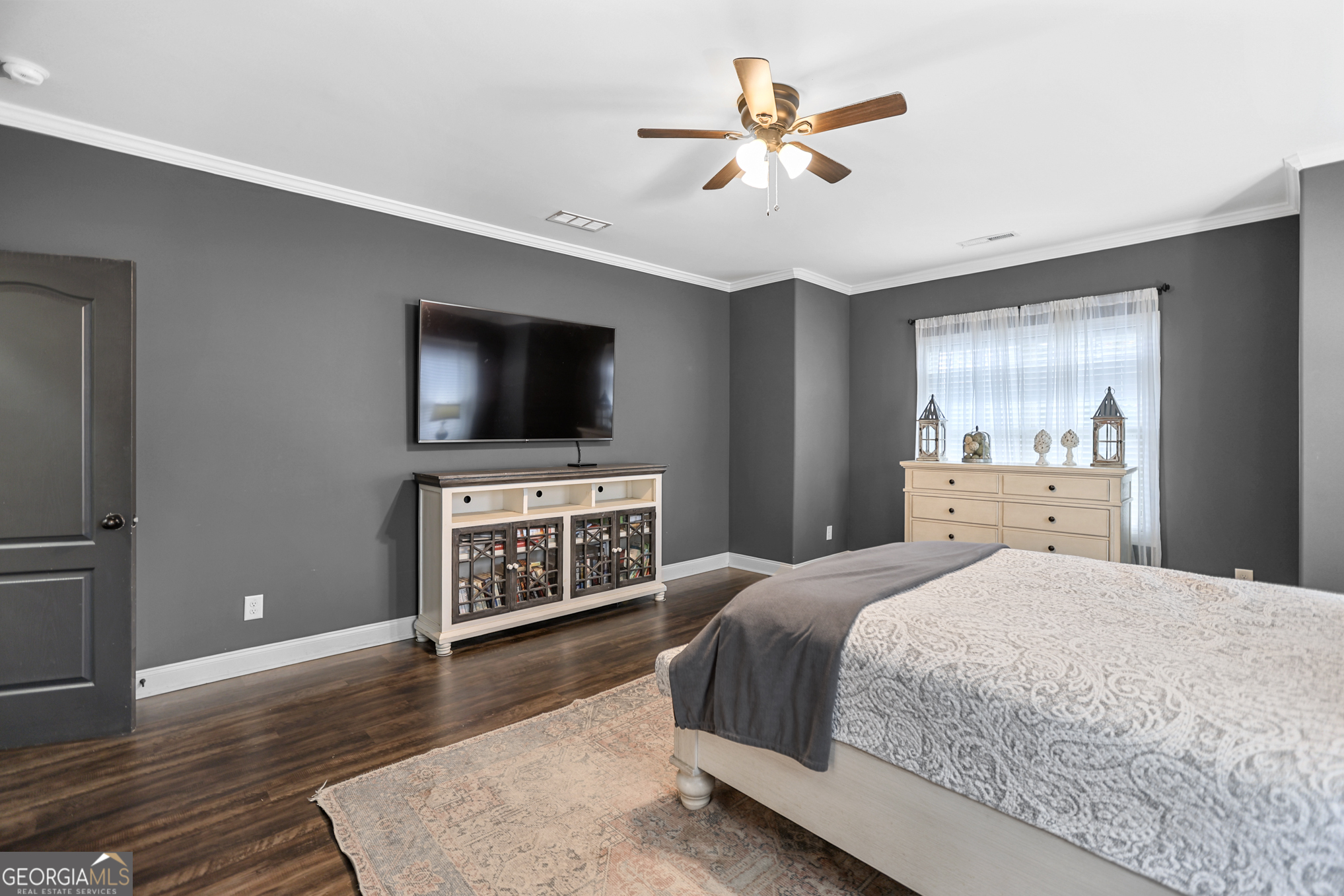 22 Huntsman Run Senoia, GA 30276 - Photo 35 of 69 a bedroom with a bed and a flat screen tv