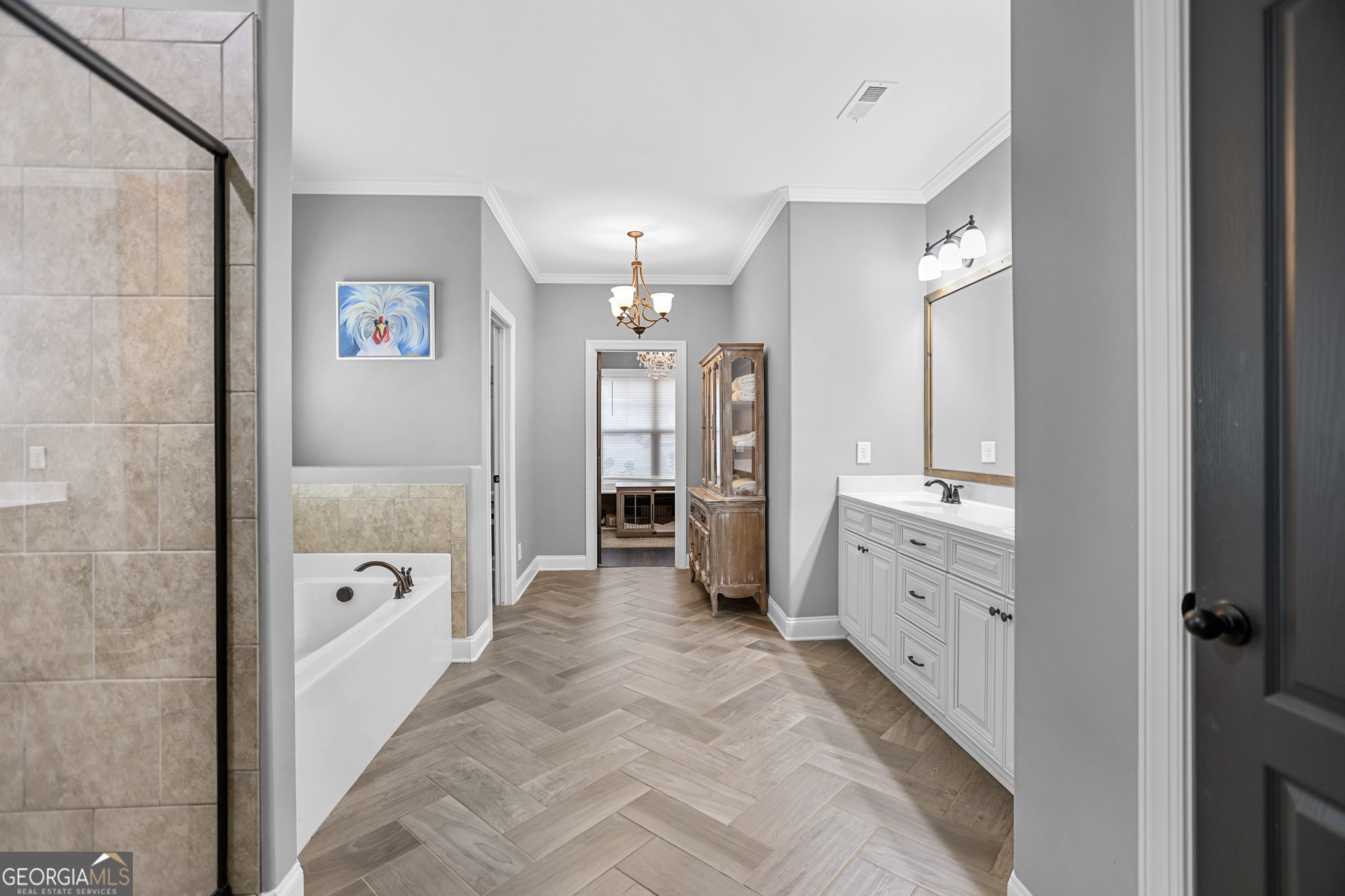 22 Huntsman Run Senoia, GA 30276 - Photo 36 of 69 a bathroom with a glass door shower a sink and a mirror