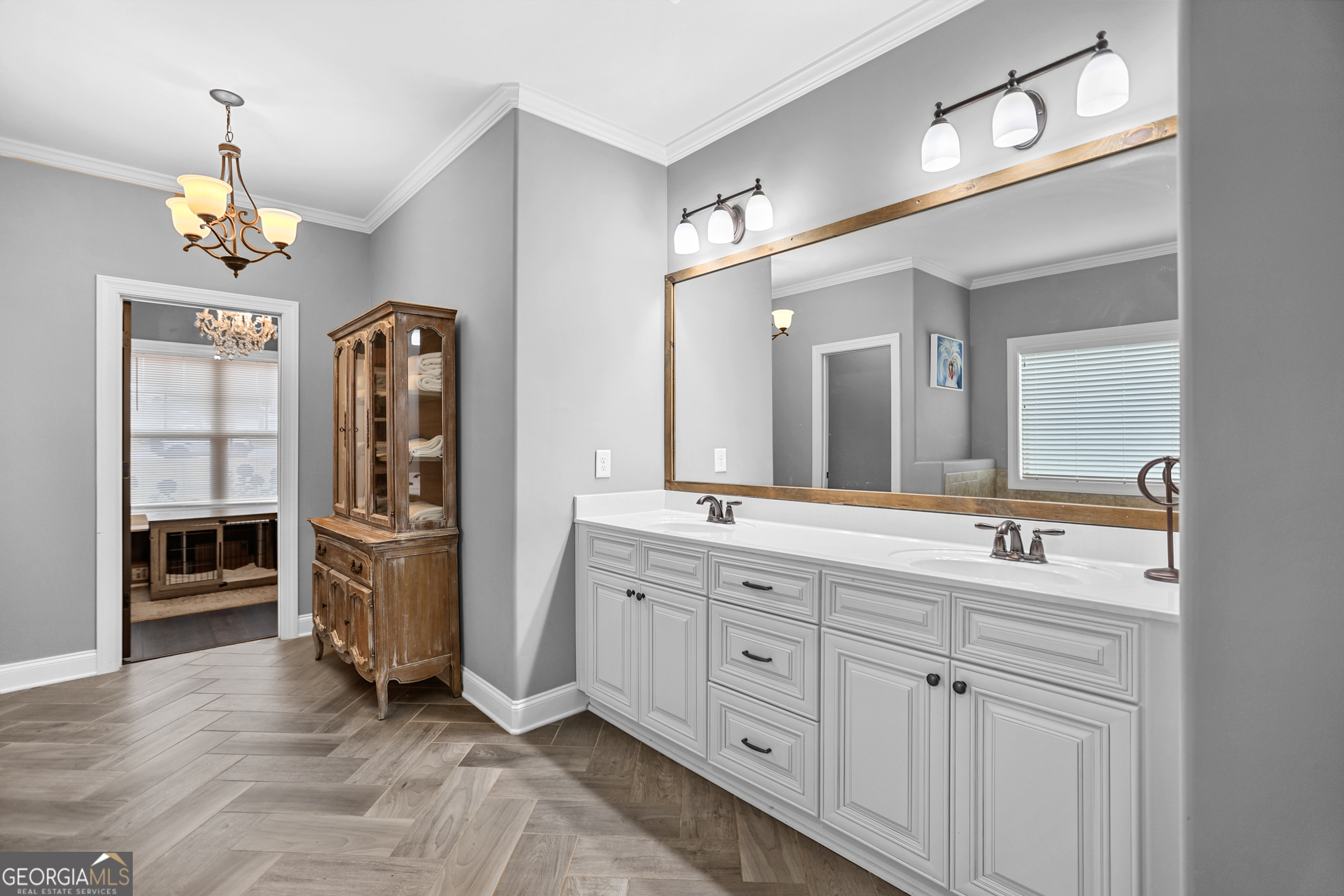 22 Huntsman Run Senoia, GA 30276 - Photo 38 of 69 a spacious bathroom with a double vanity sink and a mirror